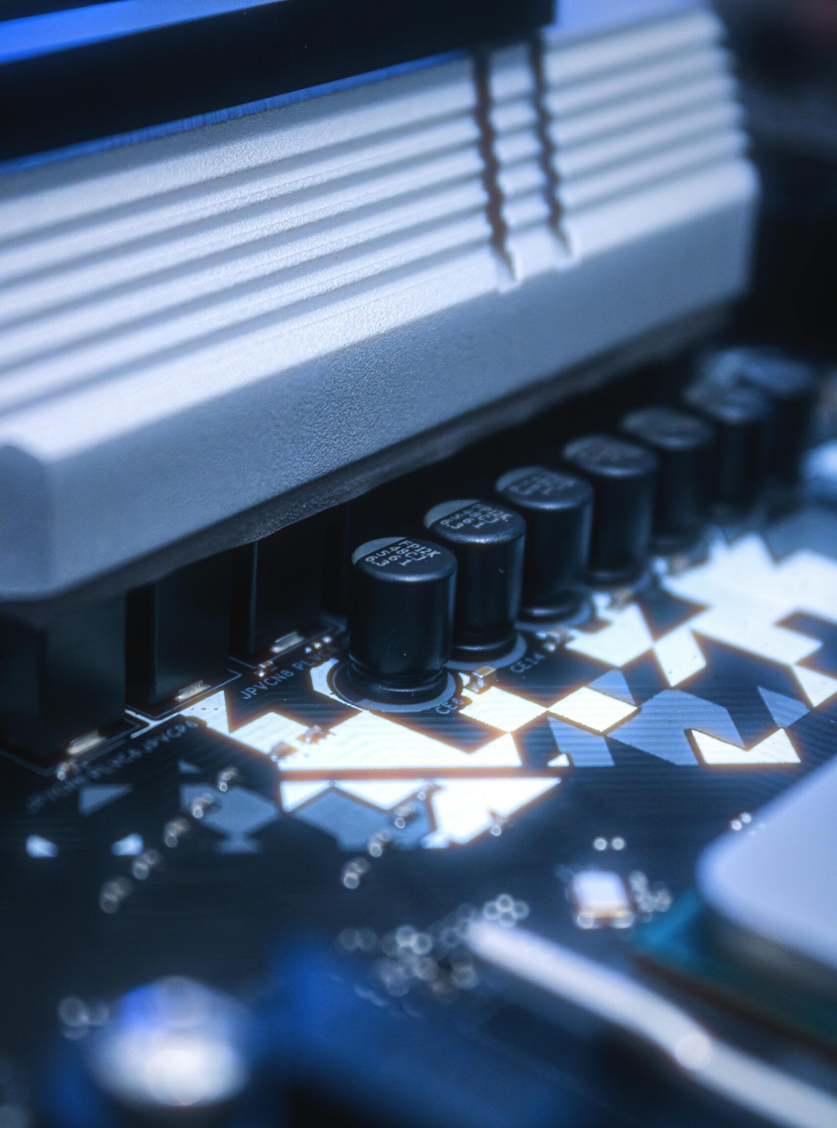 Detailed image of a circuit board featuring capacitors and intricate pathways, ideal for tech-related content.